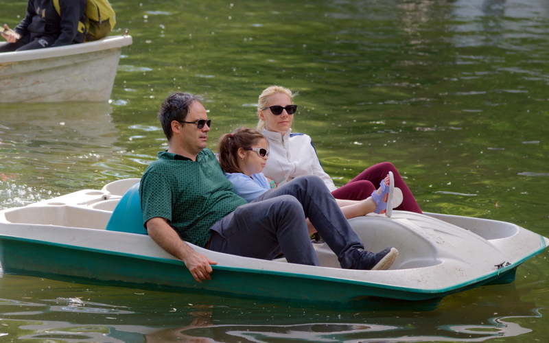 Young family in a pedal boat